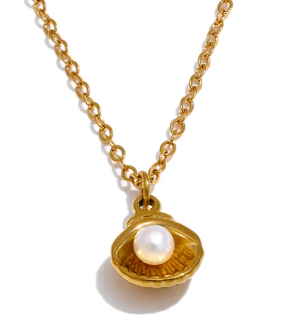 Pearl in golden shell necklace